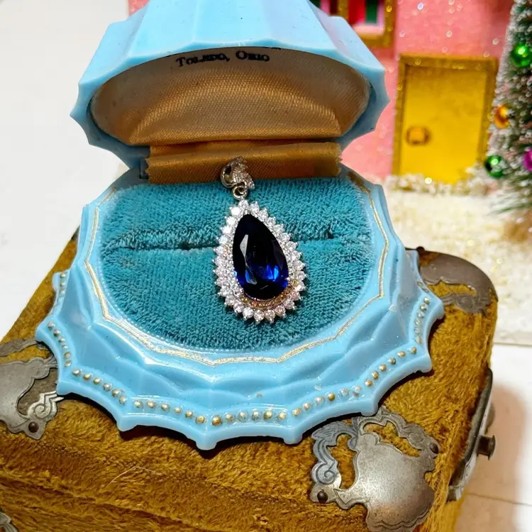 Sterling Silver Blue Spinel & White Topaz Pendant
1.5"