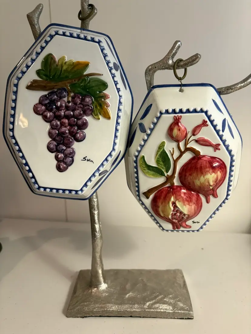 Two Italian Porcelain Wall Hangings.