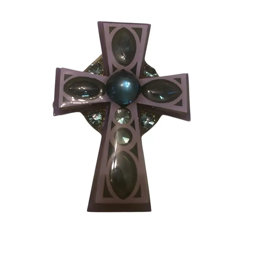 This product is a purple Celtic cross brooch Pendant featuring a central stone and smaller accent stones Handmade