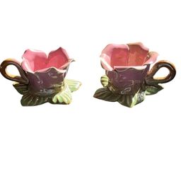 12. Set of two pink rose flower, tea, light holders.