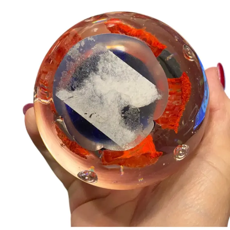 Large Paperweight With Orange Flower, Controlled Bubbles And Base Is Blue.