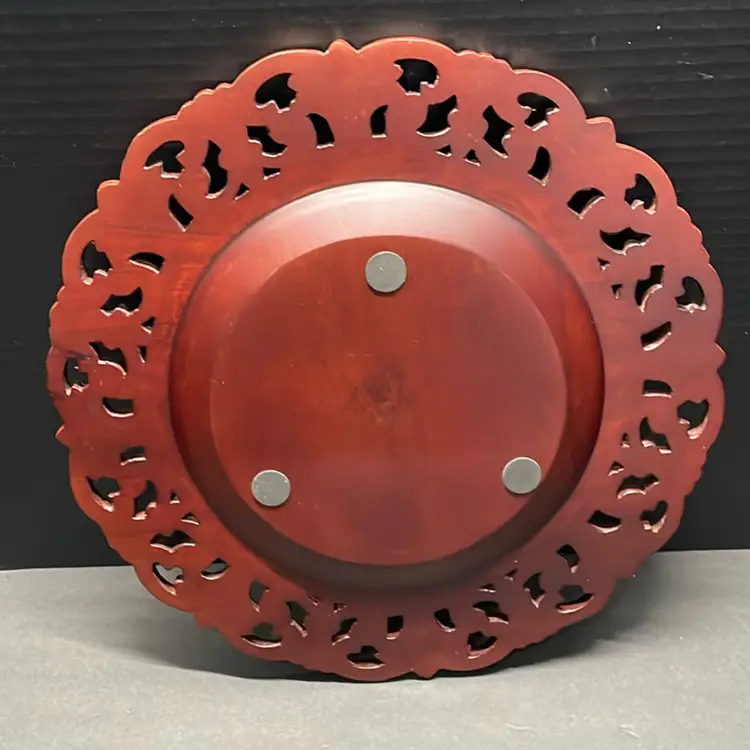 Pier 1 Imports dark brown hand-carved wooden charger plates. Set Of Four.