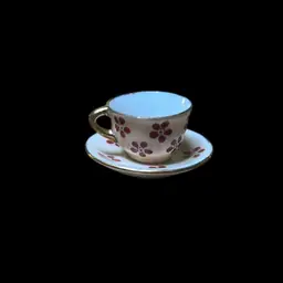 07. Miniature Porcelain Tea Cup, And Saucer, 1 Inch Tall.
