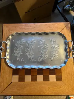 Vintage hand-wrought aluminum serving tray with embossed floral design. Tray is 17.5 x 10.5” Not Including Handles.