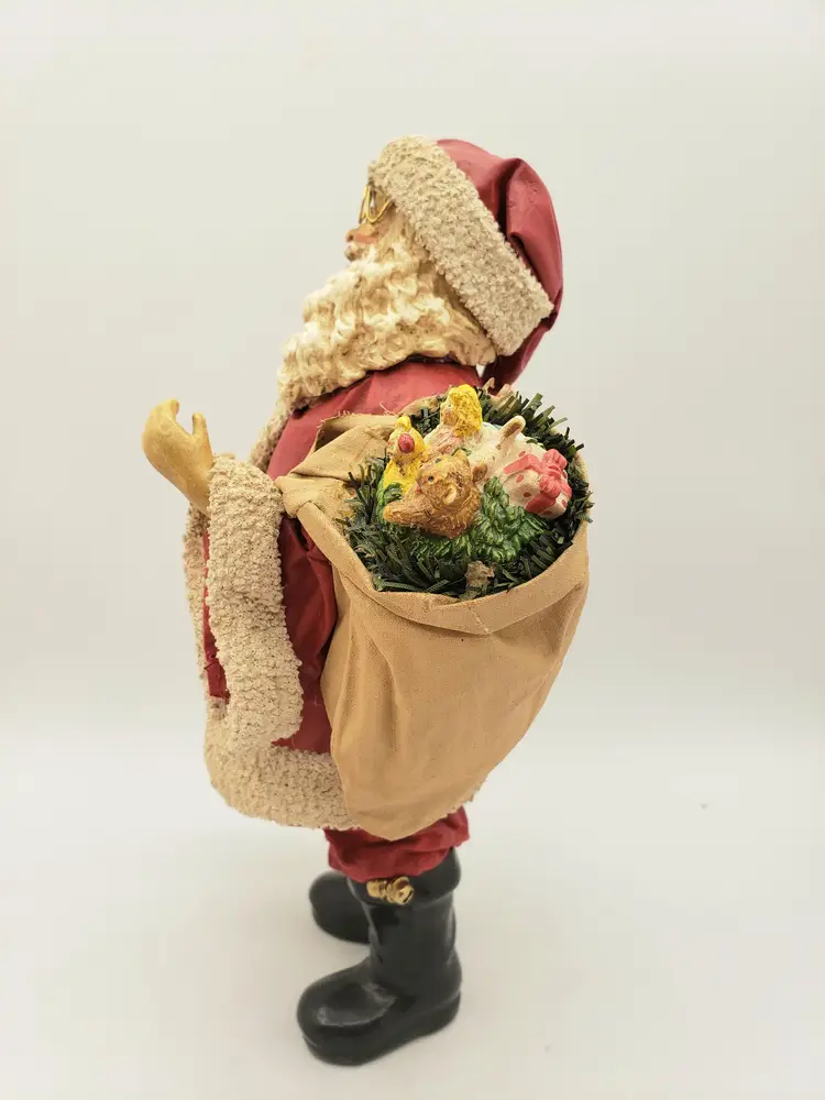 Vintage 1988 Clothtique Traditional Santa with Bell and Toy Bag Possible Dreams. This cloth Santa stands about 9.5" tall, 6.5"