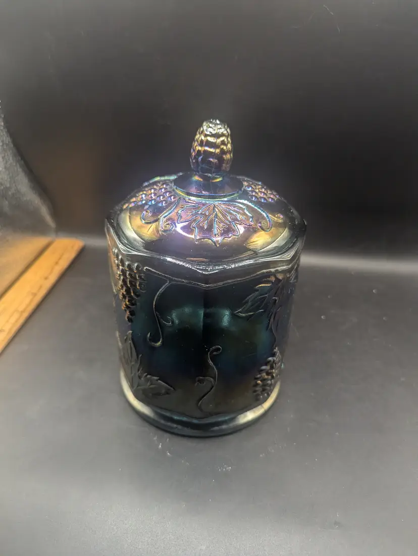 Vintage Indiana Glass Carnival Glass Canister Jar in the Harvest Grape Pattern in Iridescent Blue.