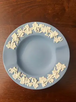 A vintage Wedgwood blue and white Jasperware ashtray with grapevine motif. 3.5” In Box