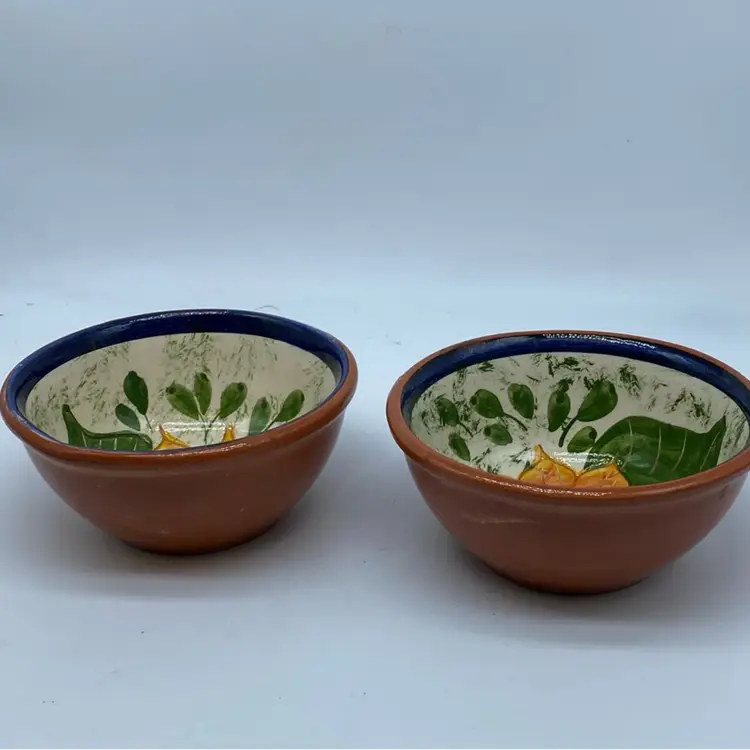 #1614 Pair of vintage hand-painted Portuguese ceramic sunflower bowls.