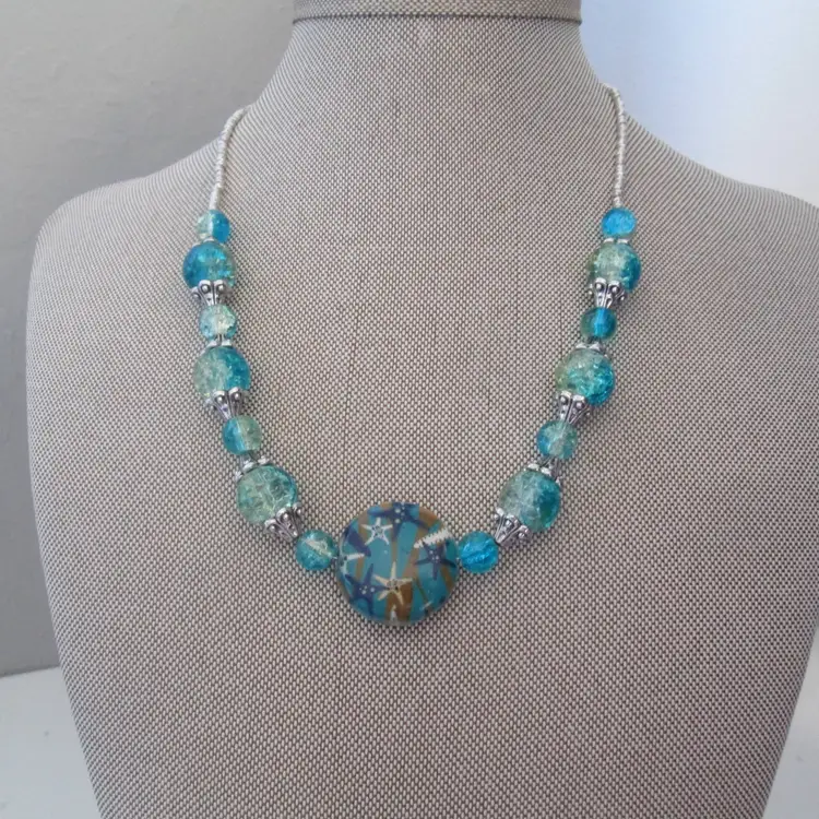 Beachy Turquoise Blue and Green Crackle Glass Beaded Necklace with Ceramic Starfish Bead