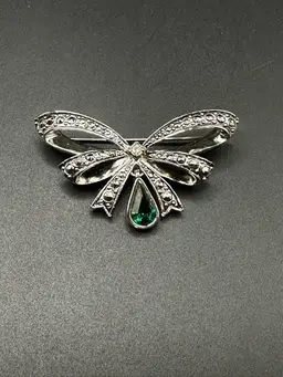 67 - Avon Faux Emerald Teardrop Dangle Bow Brooch