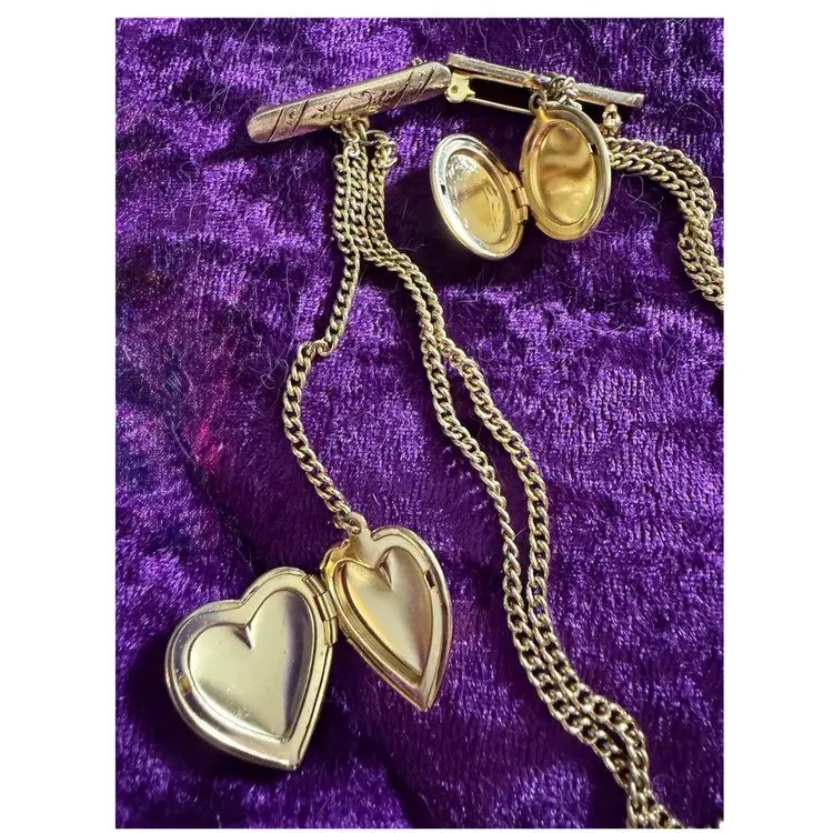 Vintage Gold Tone Chatelaine Articulated Locket Brooch - 3/4” Heart Dangles On 3” Chain -1/2” Oval Dangles On Pin - Connected by 9” & 9.5” Double Chain.