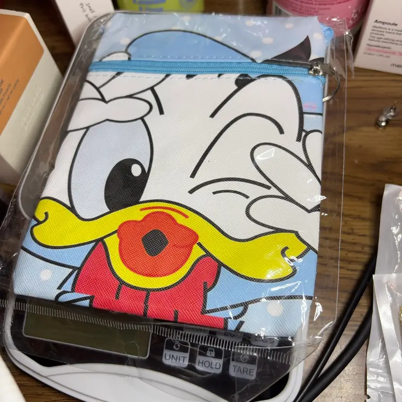 Donald Duck Cross body Bag Side 5 Inches Wide By 6 3/4 Inches Tall With A Strap