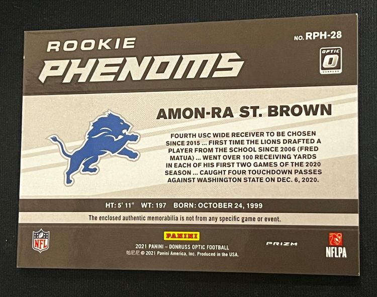 Amon-Ra St.Brown 2021 Donruss Optic Rookie Phenoms Holo Red Prizm RC #RPH-28 Detroit Lions