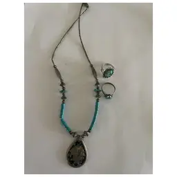 Turquoise colored necklace and Two rings