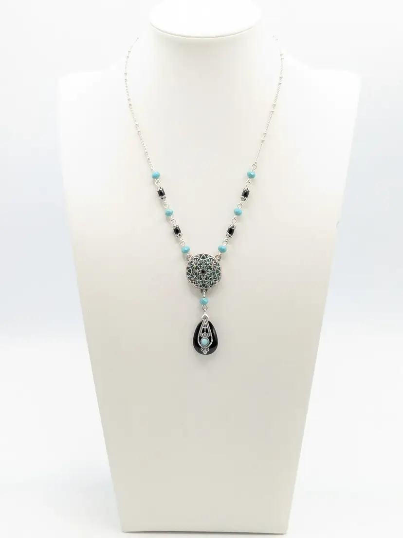 Avon Turquoise Colored and Brown Medallion Necklace Silver Tone 2009