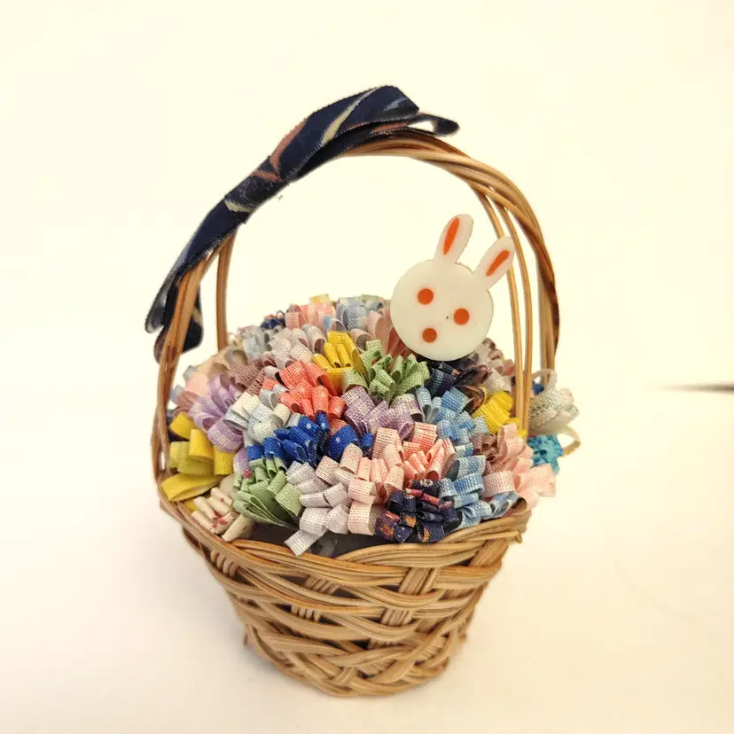 Mini Easter Themed Basket with Fabric flowers and a bunny. 5 inches high.