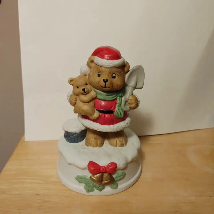 Bear santa with teddy bear. Music box. Music runs slow.