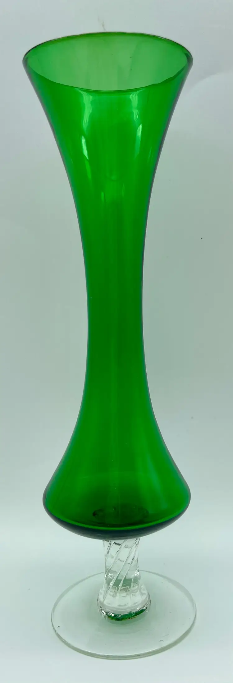 Vintage hand-blown emerald green vase with clear glass stem