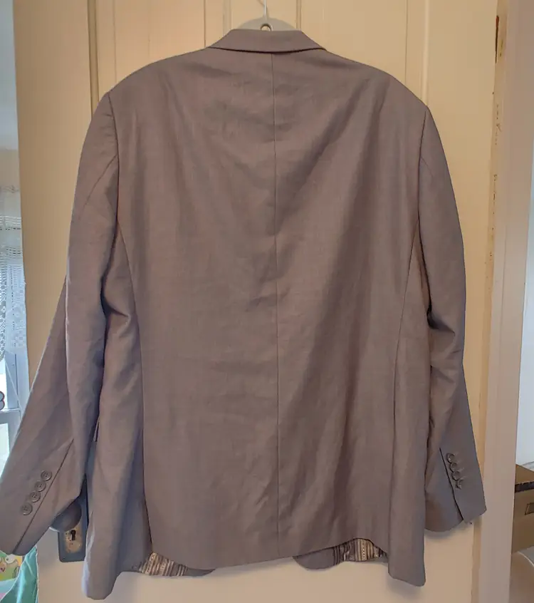 Men's Jacket- Brand: Giorgio Fiorelli. Size 44. Grey suit jacket with hand stitching. Style G45001-1. 65% polyester, 35% viscose. No callouts.