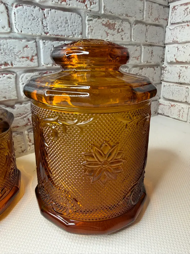 a set of vintage Tiara Indiana Glass Amber Canisters in the "Sandwich" pattern Set One