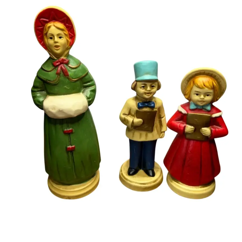 Set If Three Vintage Plastic Carolers Remnants Of Sticker Unable To Identify
@7 1/2” And 5 1/2” Tall Woman Boy And Girl