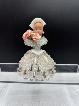 #484A Vintage Safety Pin Doll.  Clear and White Beads, Girl is Holding Flowers and is Wearing a Hat - White Accents Glow Under UV Light