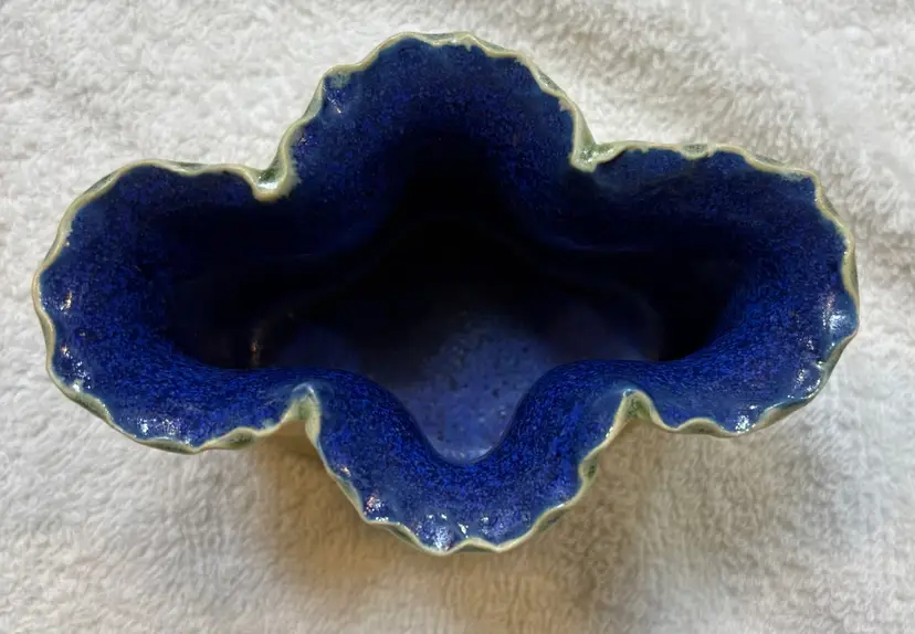 Studio Pottery By Turning Wheel. Ruffled edged Vase With Bright Blue Interior. 4.5” Wide, 3.5” High And 3.5” Deep.