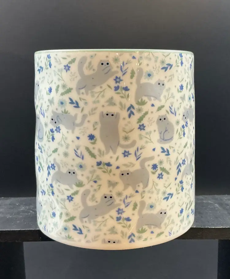 10 Strawberry Street cat mug, 16 oz, bumpy texture. Fun design.