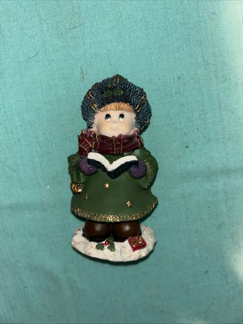 Christmas girl made of resin 6 inches tall