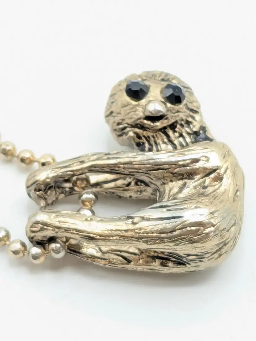 Quirky Hanging Sloth Pendant Necklace with Black Rhinestone Eyes Silver Tone