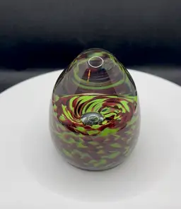 Signed Bogenrief Studios green brown confetti art glass egg shaped paperweight