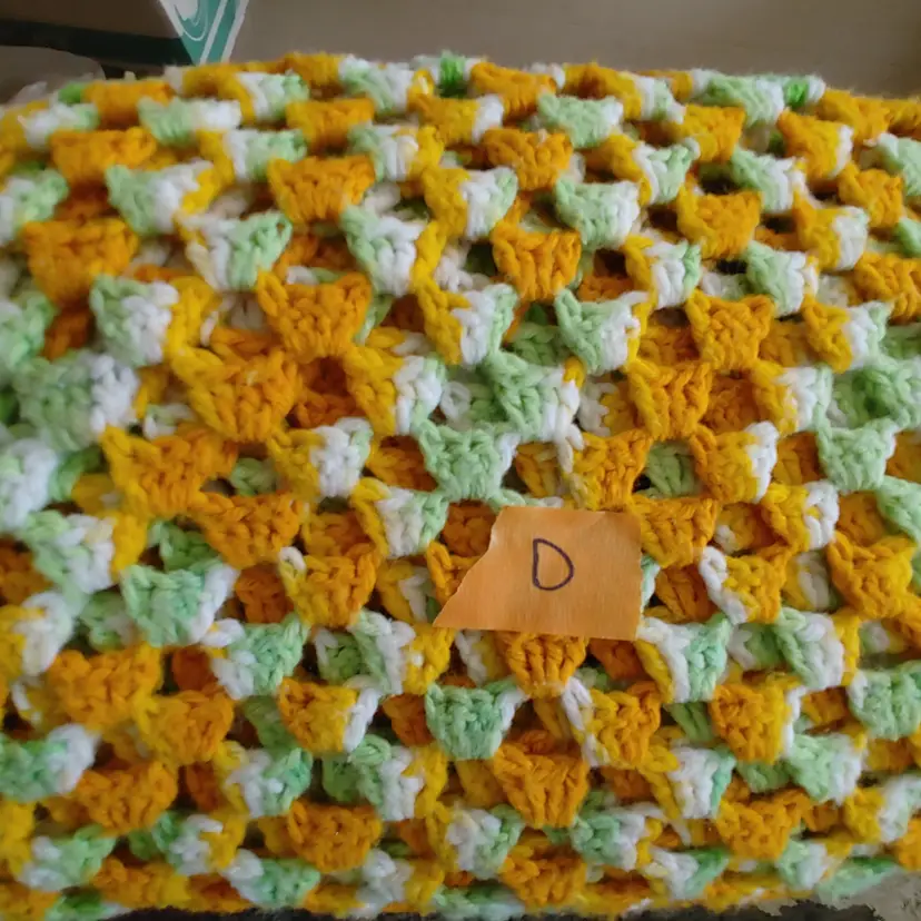 Afghan D- approx size 48 x 78. Gold & green triangles. As shown.