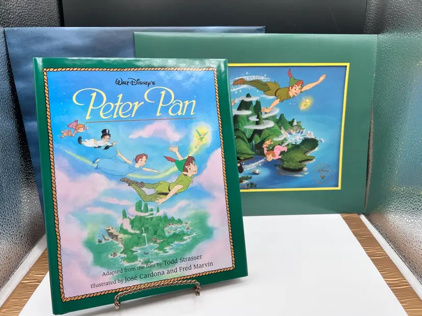 #1078B Vintage 1994 Walt Disney Peter Pan Lithograph With Sleeve and Peter Pan Hard Cover Book Also With Protective Cover.