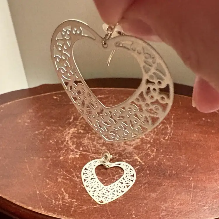 White Metal Heart Shaped Dangling Earrings