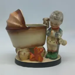 #4914 Vintage Japanese ceramic figurine of a praying boy with a baby carriage and dog.