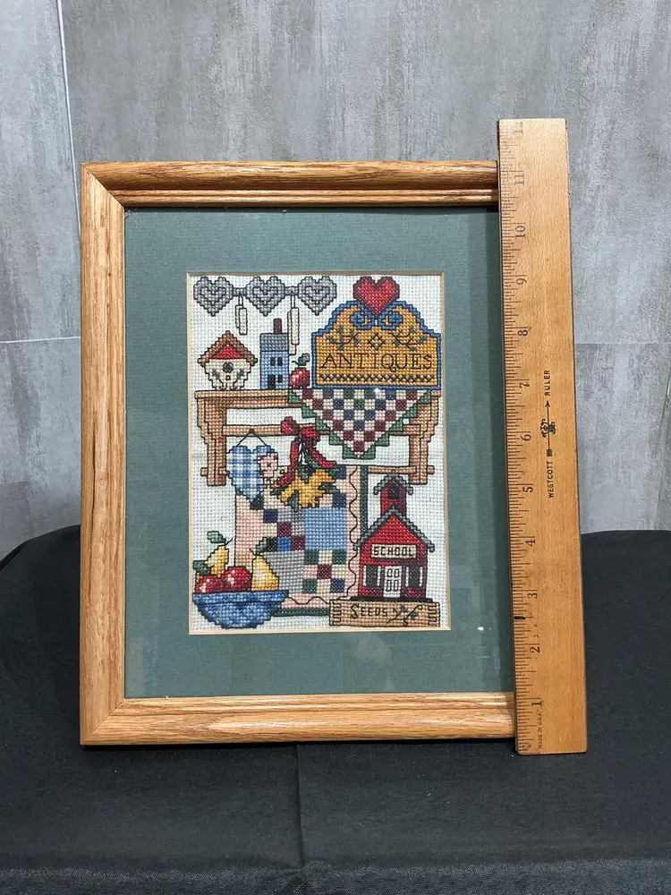Framed with matting Country CrossStitch Antique Shop Folk Art Sampler 70s-90s