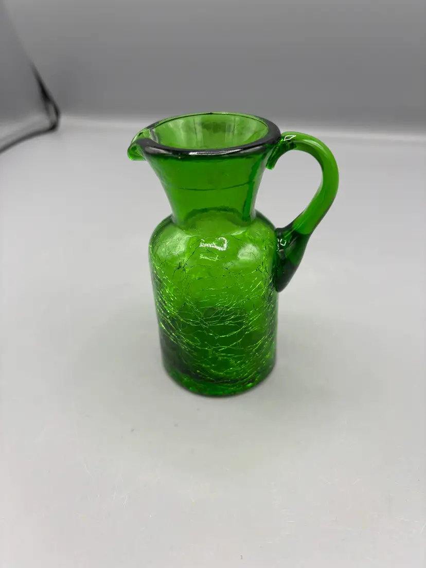 Emerald green crackle glass pitcher