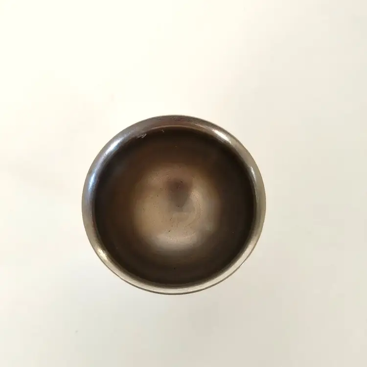 Stainless-steel Egg Cup. Made in Denmark. 2 inch diameter. 1.5 inches high.