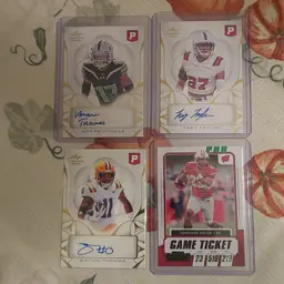 Lot of 10 college football cards. 3 auto's, 1 #'d, +. Letter T.