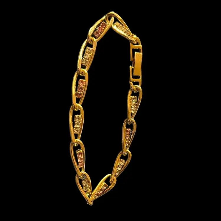 Gold Tone Link Bracelet With Rhinestones In The Links