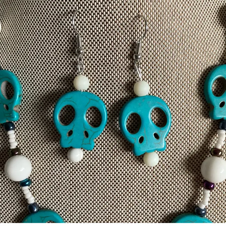 Spooky Carved Stone Skull Necklace With Matching Earrings