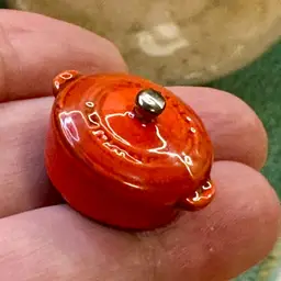 1 inch Mini miniature Le Creuset cocotte, also known as a mini Dutch oven.