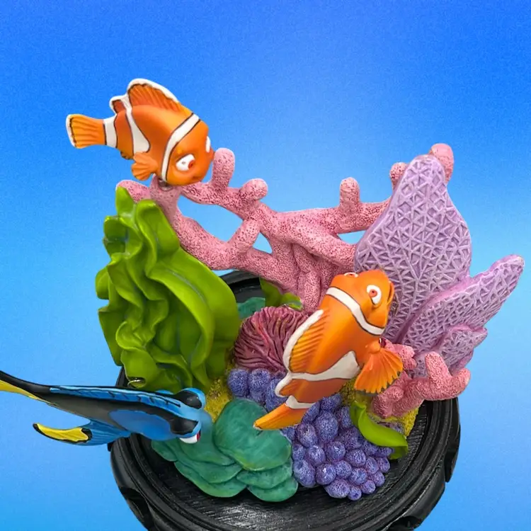 Disney Finding Nemo and Friends coral reef figurine with Nemo, Marlin, and Dory.