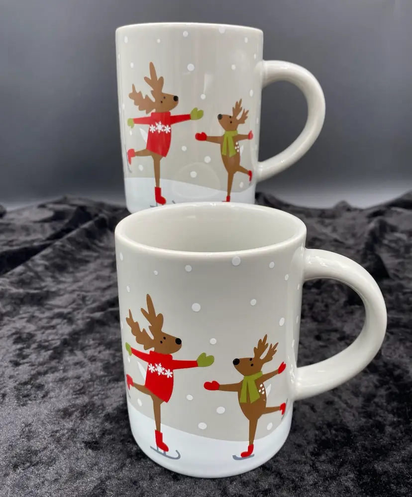 Pair (2) Crate & Barrel Joan Anderson Skating Reindeer Coffee/Tea Mugs Christmas