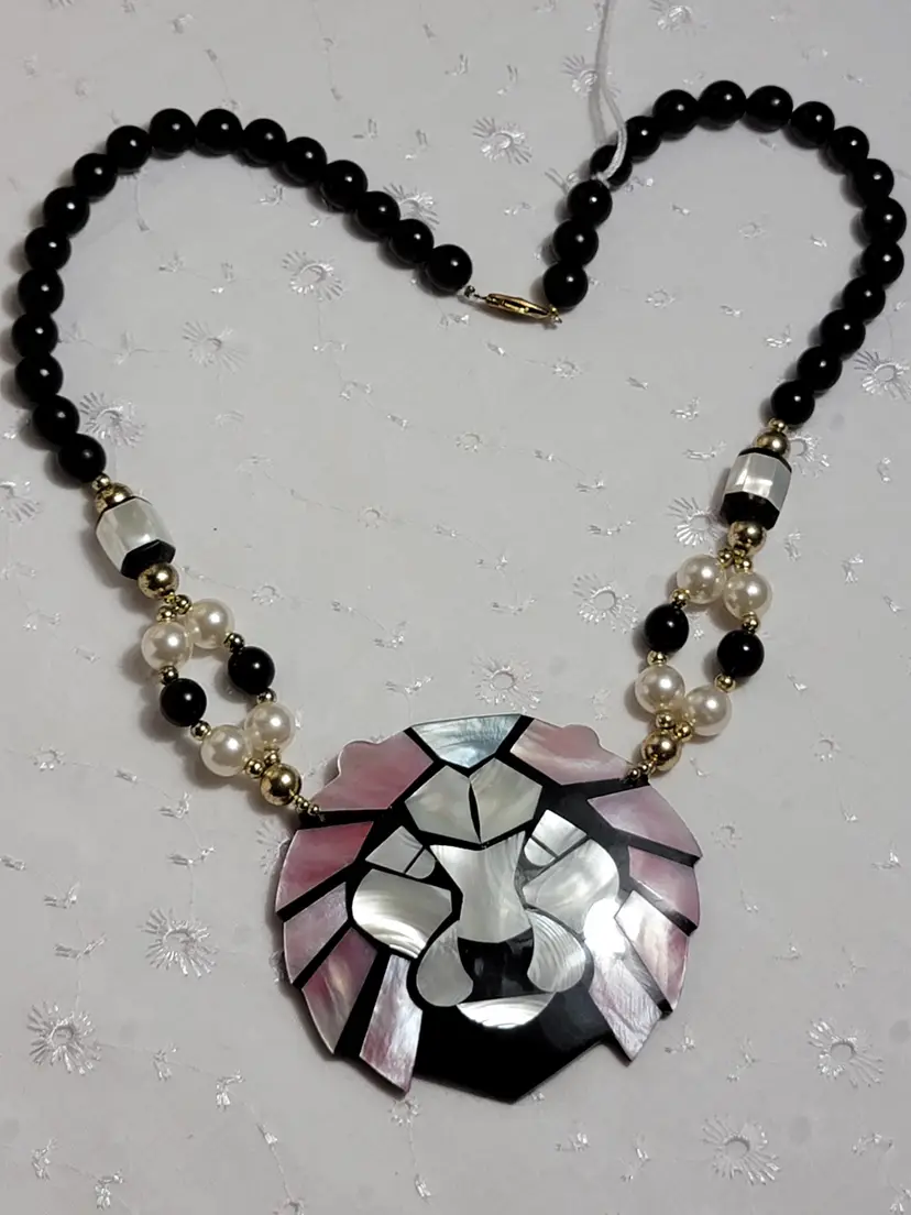 Gorgeous Lee Sands lions head statement necklace