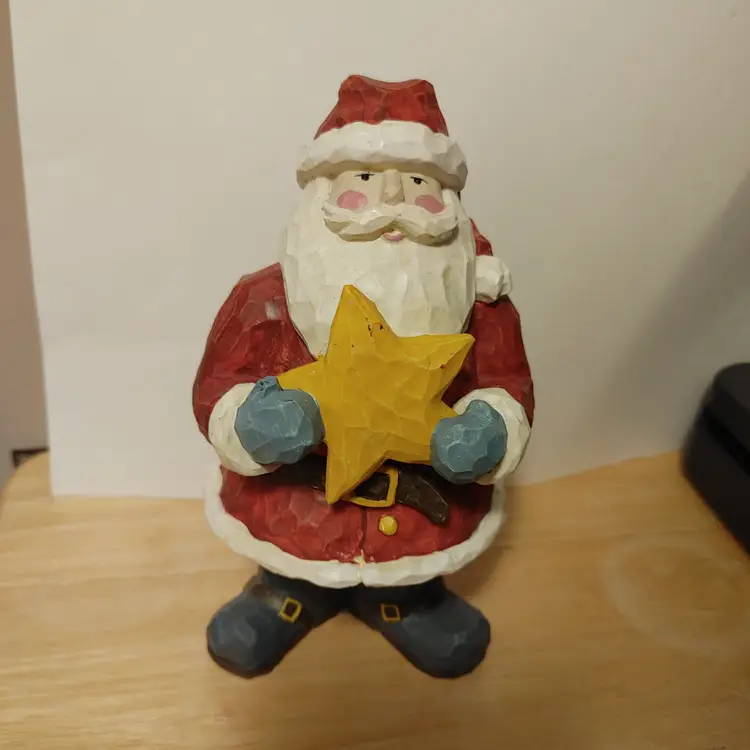 Santa figurine with star.  No condition issues.