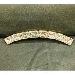 Vintage Rhinestone Curved Bar Brooch with Large Emerald Cut Stones in Gold Tone Metal