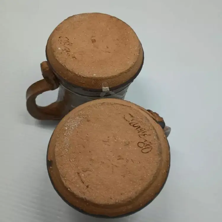Vintage Studio Pottery set of 2 mugs. Signed.