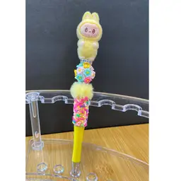 🌼🍭 Sugar Daisy Lemon Pop Labubu 1/1 Pen 🍭🌼 (labubupens.com)
