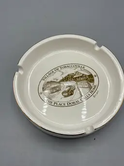 Vintage Ceramic ashtray featuring Village of Tobbaccoville